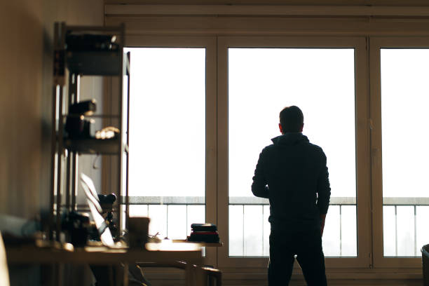 istock Young freelancer working from home in the morning while having coffee.  Small business owner working in home office by himself alone at home. 1212621115
