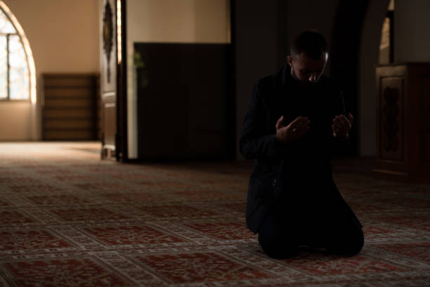 istock Muslim Praying In Mosque 1212621938