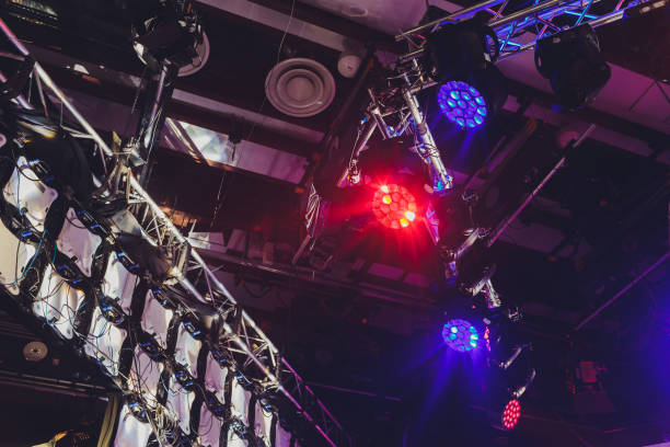 istock Modular LED display for a display screen wall to project video walls on the mounted led modular panel system. grid video rgb diode light mesh equipment for video grip billboard digital screen panel. 1212623222