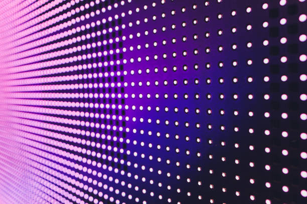 istock Bright colored blue LED wall with pink pattern - close up background. 1212623223