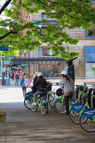 Seattle, United States - April 22nd, 2015: Tourists riding on bikes for City Sightseeing in Downtown Seattle Washington.