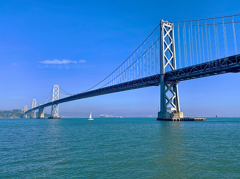 Officially called the San Francisco-Oakland Bridge, it is part of the I-80 between San Francisco and Oakland. Constructed in the 1930s, it passes through Treasure Island and today only carries automobile traffic.