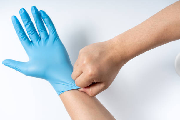 istock Hands are wearing nitrile gloves 1212634244