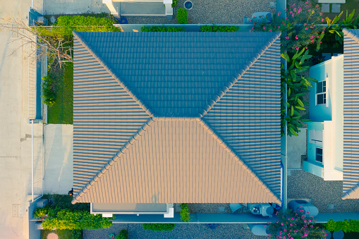 Top view of home roof and tile, brown color.