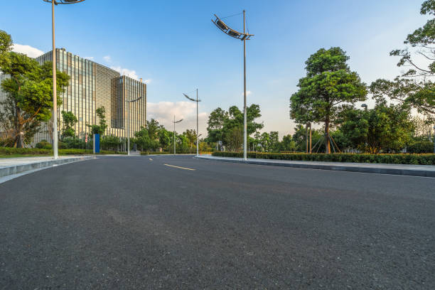 istock city empty traffic road with cityscape in background 1212635113