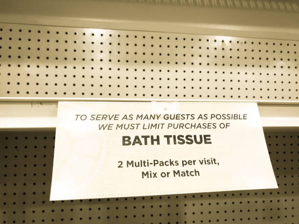 Empty Shelves: Shop Sign Announcing Limit on Bath Tissue/Toilet Paper Empty Shelves: Shop Sign Announcing Limit on Bath Tissue/Toilet Paper sold out photos stock pictures, royalty-free photos & images