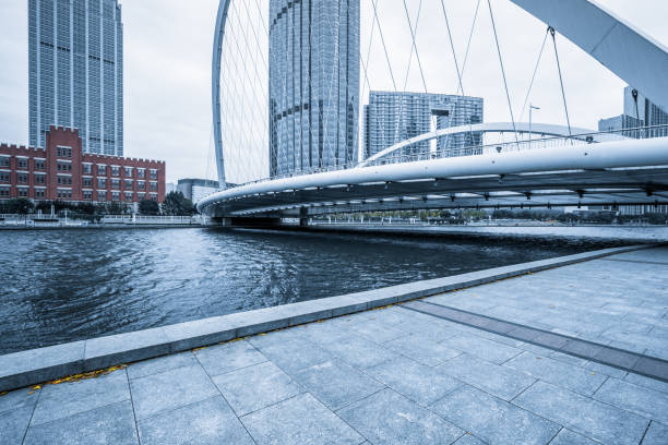 istock empty floor and city skyline under blue sky, tianjin, china 1212635145