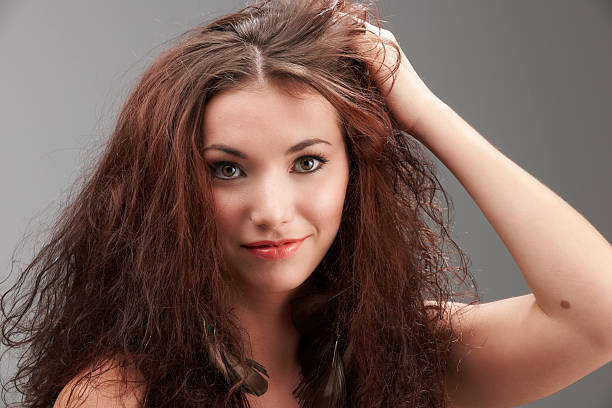 Messy hair  frizzy stock pictures, royalty-free photos & images