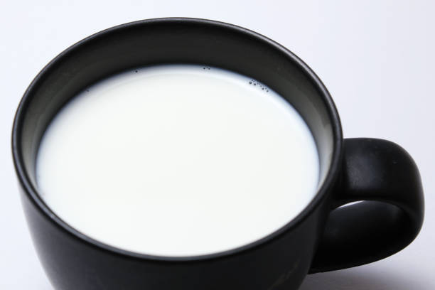 istock Black cup of hot milk 1212647466