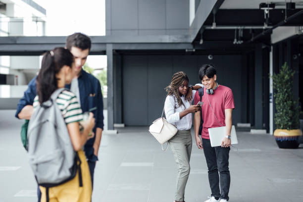 istock Multiethnic Group of Students Chatting on the Campus 1212649250