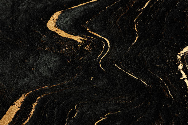 istock 3D render. Black golden natural texture. Abstract black, gold and yellow background. Stone texture for the design of digital wall tiles. Copy space. 1212650126