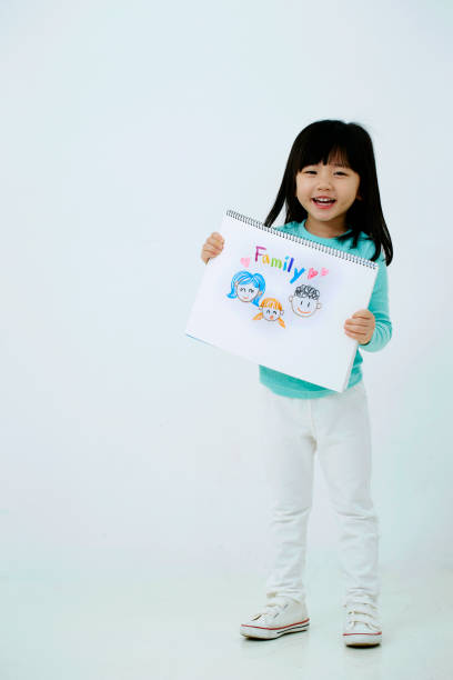 istock Korean girl with drawing 1212651349