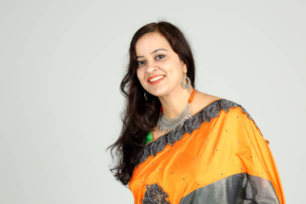 istock Indian woman posing on off white background 1212666817