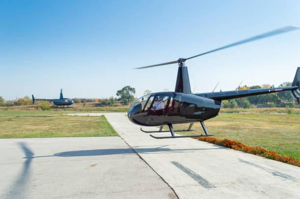 istock Pilots touching down on the helipad 1212666886
