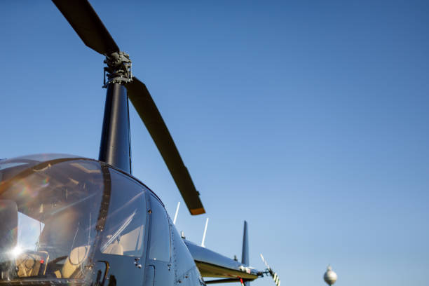 istock Helicopter cockpit and mast with rotors 1212666887
