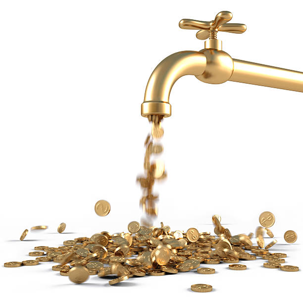 gold coins fall out of the golden tap. isolated on white.