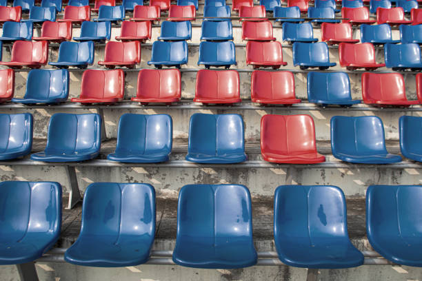 istock empty seat on stadium for sport fanclub 1212671034