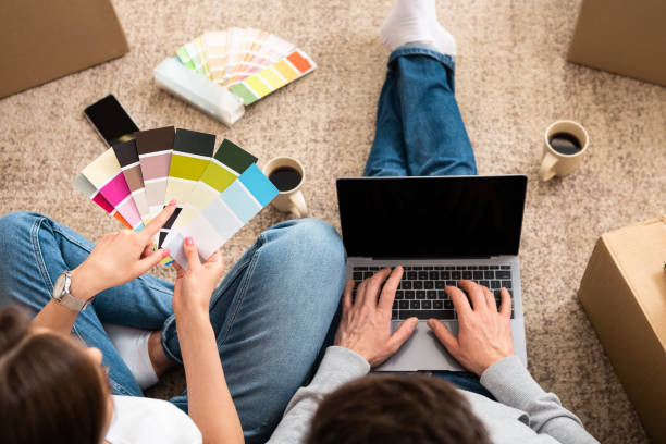 istock Unrecognizable couple choosing color palette, New house project 1212678247