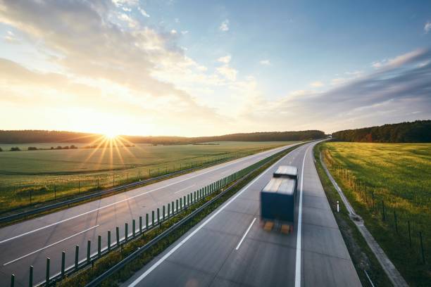 istock Highway at beautiful sunrise 1212679864