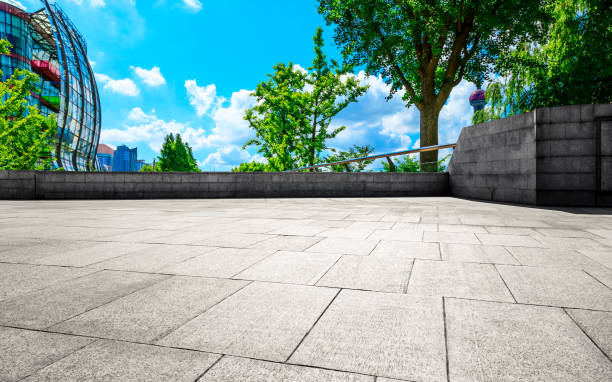 istock Shanghai square pavement and urban architecture landscape in summer 1212682384