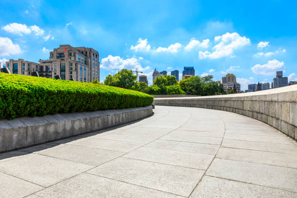 istock Shanghai square pavement and urban architecture landscape in summer 1212683469