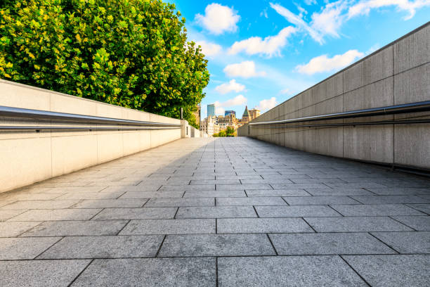 istock Shanghai square pavement and urban architecture landscape in summer 1212683470