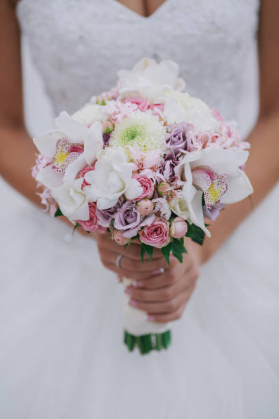 istock wedding bouquet in bride's hands 1212684108