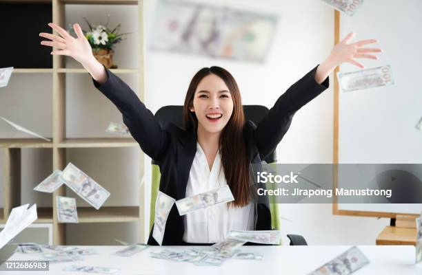 Business Women Hug Money On Office Her Concept For Success Business And Financial Freedom Stock Photo - Download Image Now