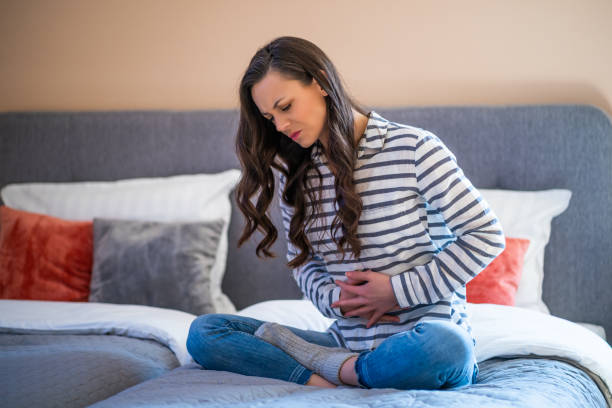 istock Woman having pain stomach 1212687479