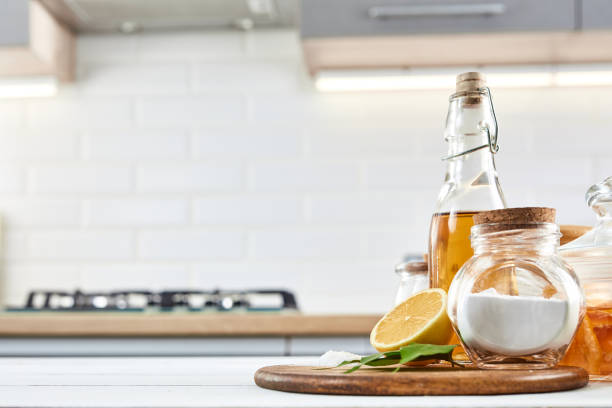 istock Eco friendly products for home cleaning, zero waste lifestyle, set on white kitchen background. 1212687642