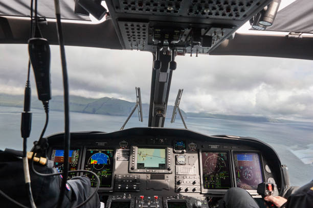 istock Helicopter cabin flying over Faroe Islands coastline. Denmark 1212689527
