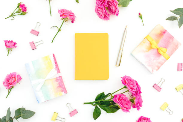 istock Female composition with notebook, eucalyptus, gift and roses on white background. Flat lay. 1212690761