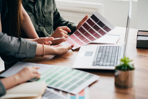 istock Business people collaborating on project in office 1212692745