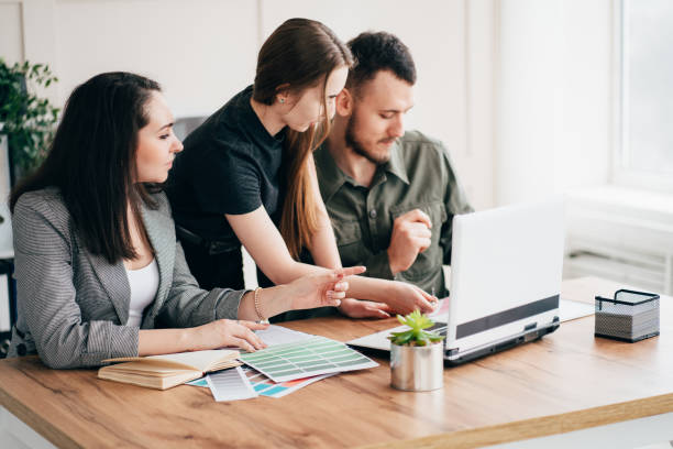 istock Team brainstorming ideas, working in the office 1212692752