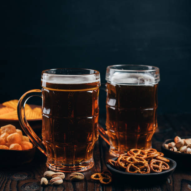 istock lager beer and salty traditional appetizers 1212692769