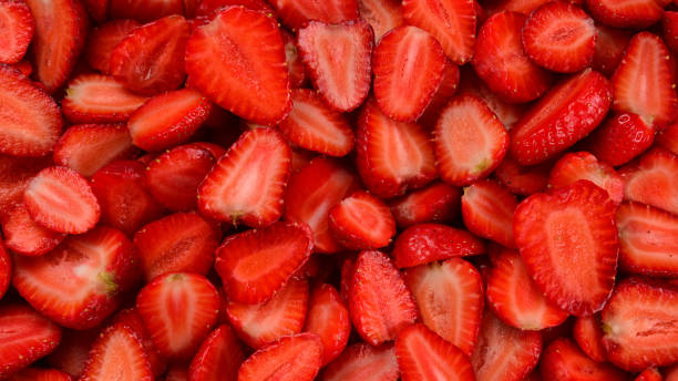 istock Strawberry slices. Fresh berries macro. Fruit background. Top view. 1212694771