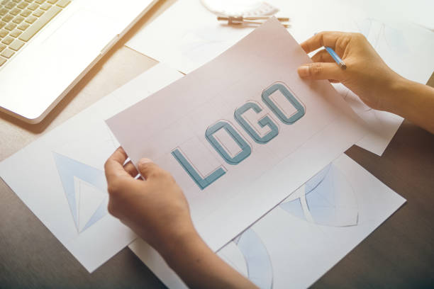 istock Graphic designer creative design sketch drawing logo Trademark brand Workspace 1212695464