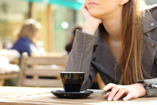 istock Impatient woman waiting on a cafe terrace 1212698536