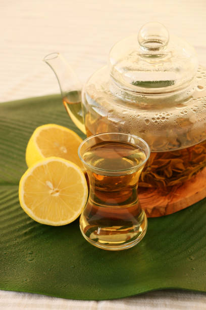 istock Sage Tea in Glass Cup and Glass Teapot 1212698571