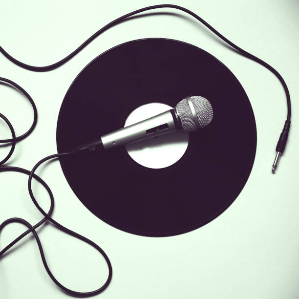 istock Microphone on record. Retro music. Disco party. 1212703058