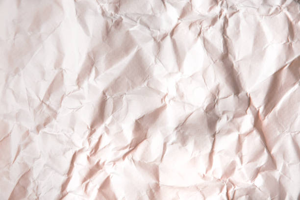 istock Rumpled beige background. Real texture of the wrapping texture. 1212703157