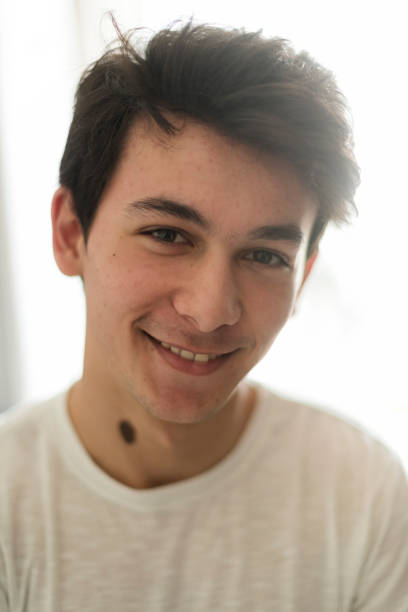 istock Happy teenage boy smiling to camera 1212703238