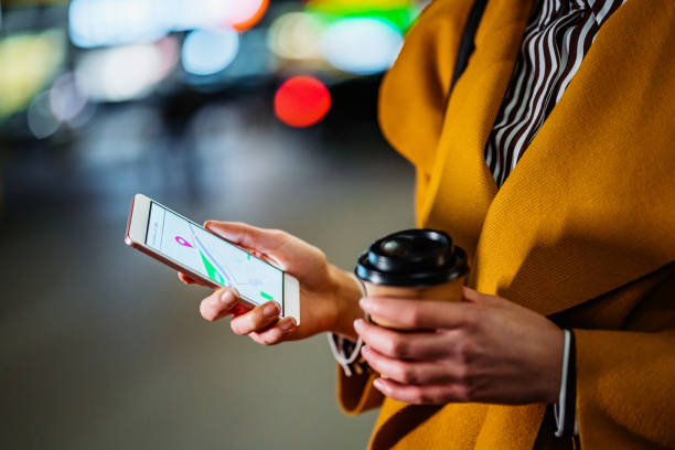 istock Young woman calling crowdsourced taxi 1212703531