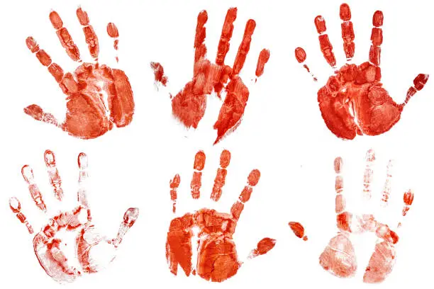 Photo of Set of Human Hands Bloody Prints