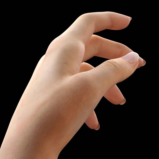 istock Beautiful woman's hand isolated on black 1212706215