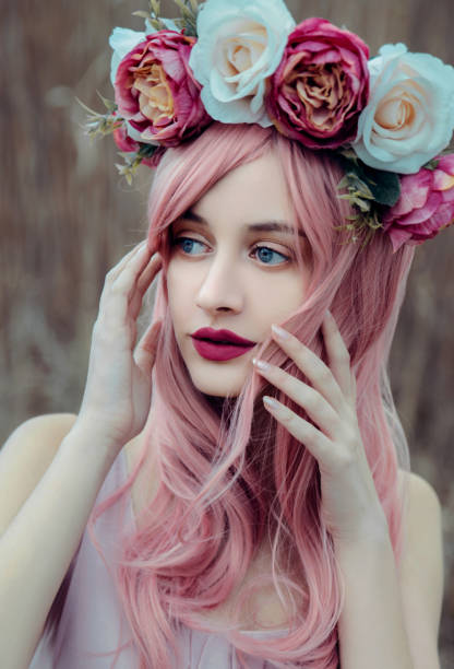 istock Young woman with flower crown 1212706697