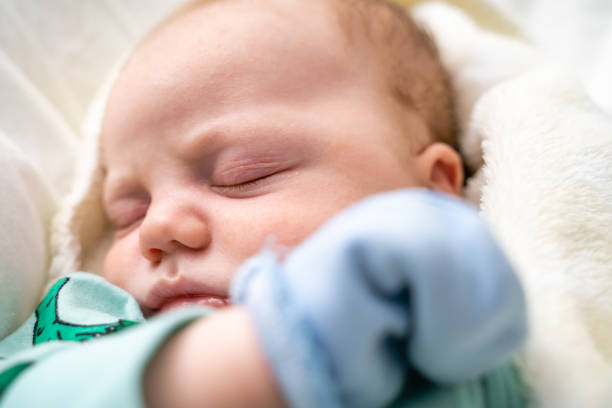 istock Beautiful baby boy sleeping close-up 1212711779