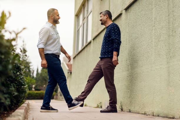 COVID-19 Greeting Concept. "Foot shake" a new way of greeting that avoid handshake to stop the spread of the coronavirus COVID-19 "Foot to foot" Greeting Concept. "Foot shake" a new way of greeting that avoid handshake to stop the spread of the coronavirus. hand-hygiene-day stock pictures, royalty-free photos & images