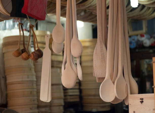 istock Wooden spoons and fork. Close-up. Light brown color. 1212713425