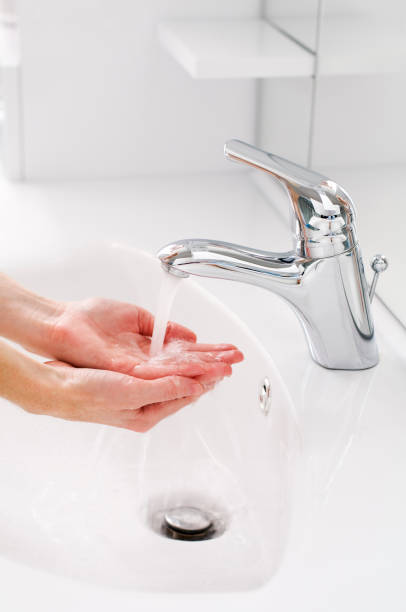 istock Hand washing to prevent coronavirus infection spread 1212713538